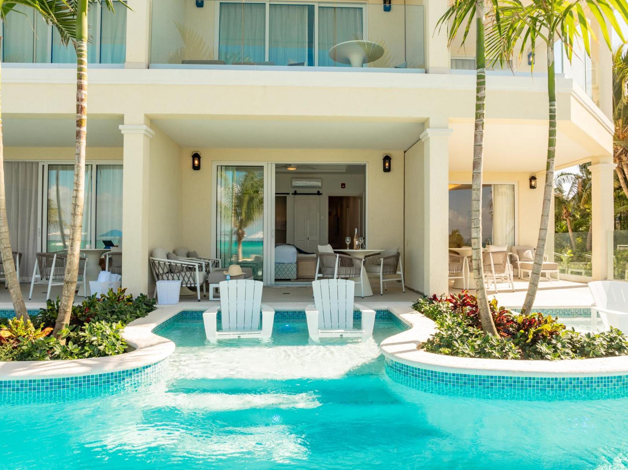 Hotel Windsong On The Reef à Grace Bay Extérieur photo